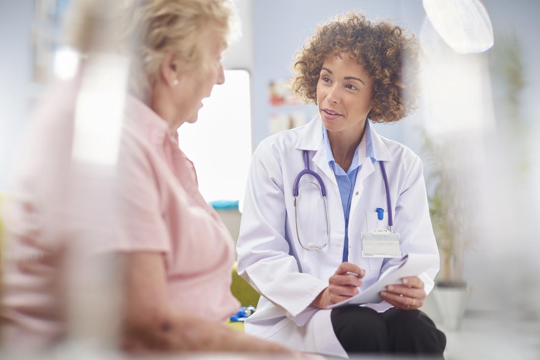 Doctor speaking with her patient