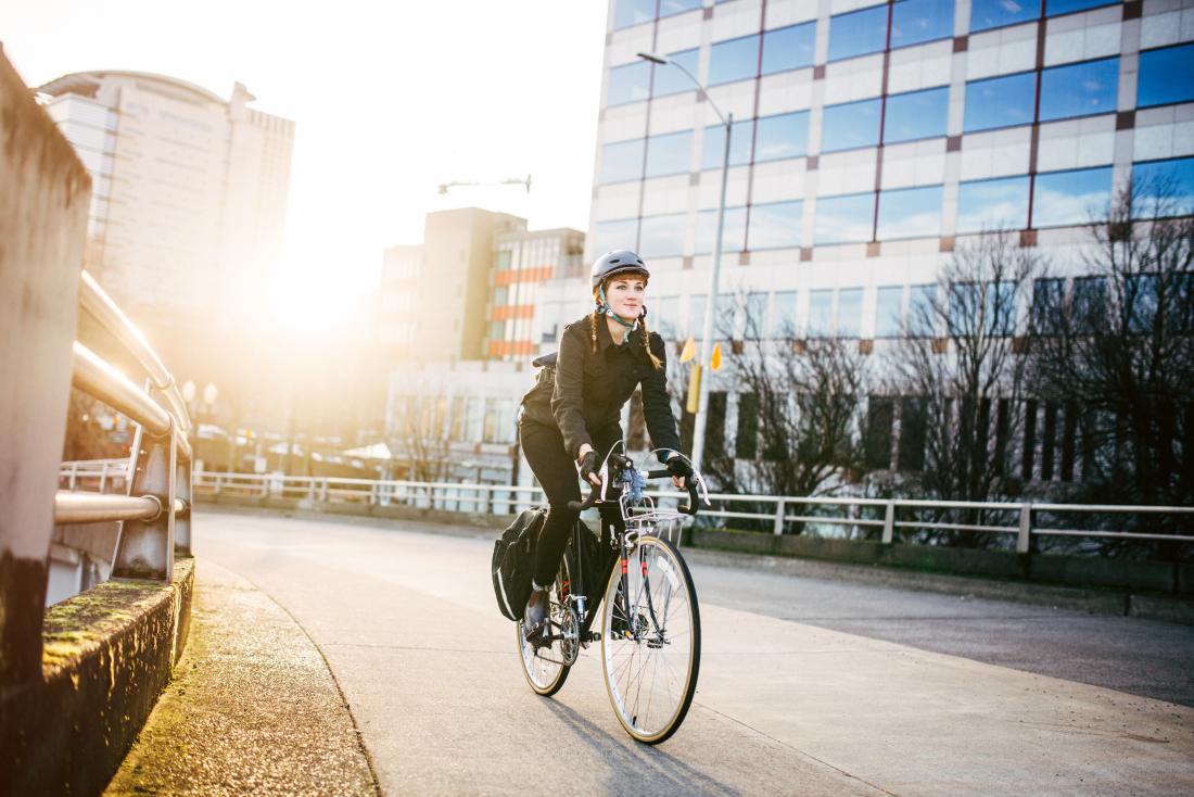 women cycling to work