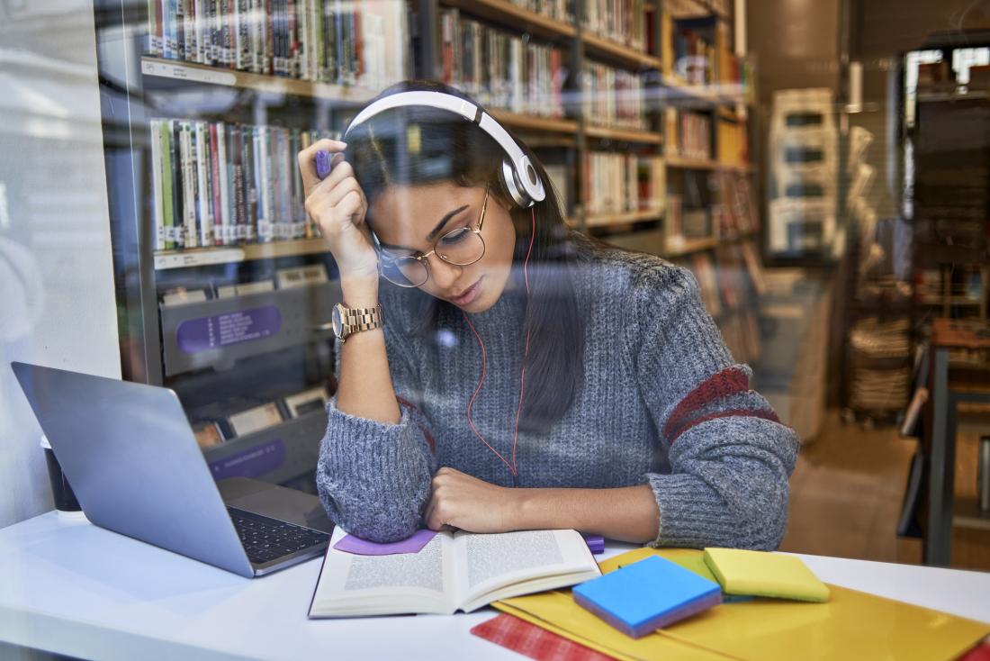 woman studying in library